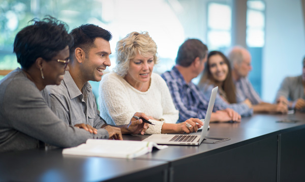A group of faculty collaborating.